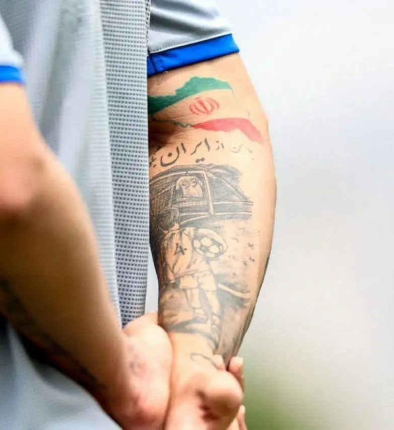 جمله معنادار روی خالکوبی روزبه چشمی  