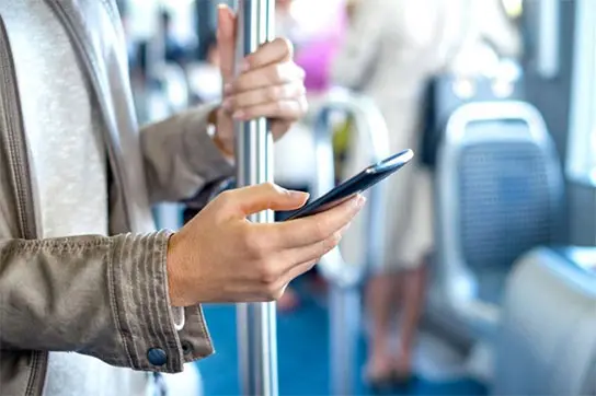 08-public-transportation-Cell-Phone-Etiquette-Tips-Everyone-Should-Know-511026728-LDProd-760x506