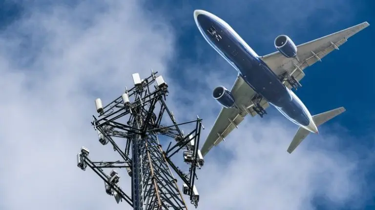 cell-tower-with-airplane-flying-over-it-2-768x431