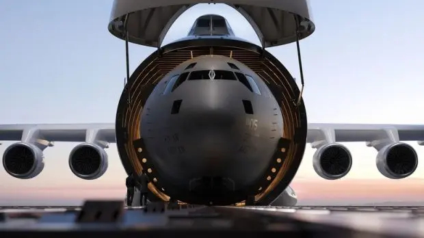 radia-windrunner-with-plane-fuselage-in-open-cargo-1-620x348_11zon