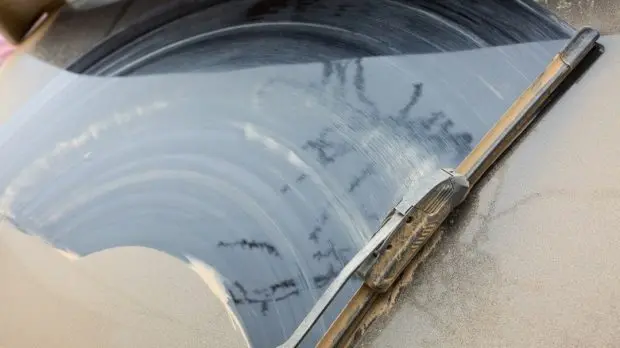 dirty-windshield-getting-wiped-1-620x348