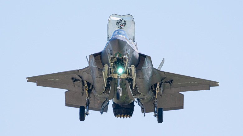 2-an-f-35b-fighter-jet-hovering-in-the-gloomy-sky