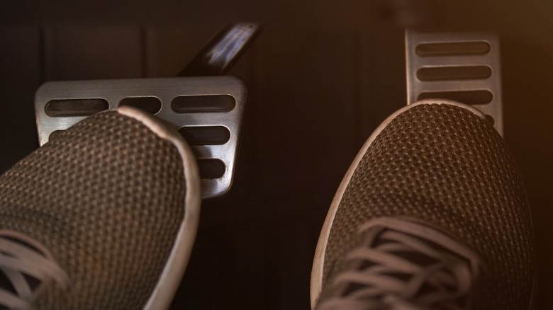 1-two-feet-on-car-pedals