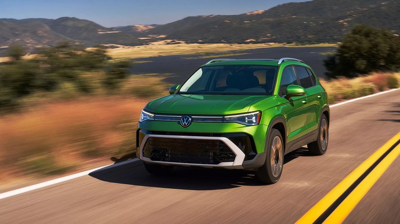 least-reliable-car-brands-2025-1-a-green-2025-volkswagen-taos-driving