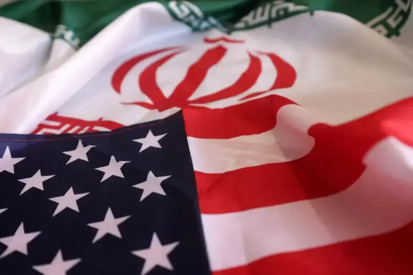 us-iran-flags-reuters-6a392ec4d251ec0446223e28