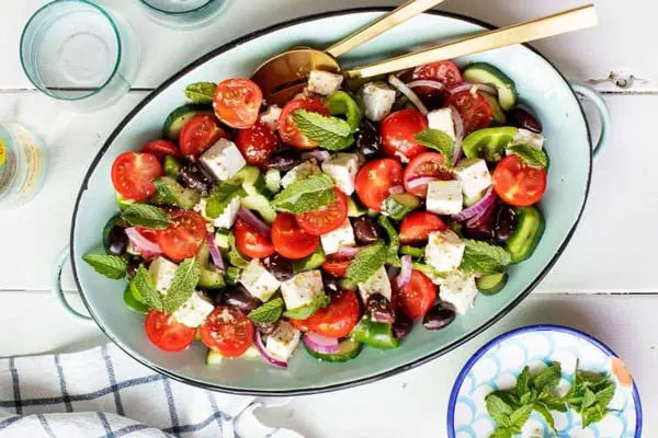serving-Greek-salad