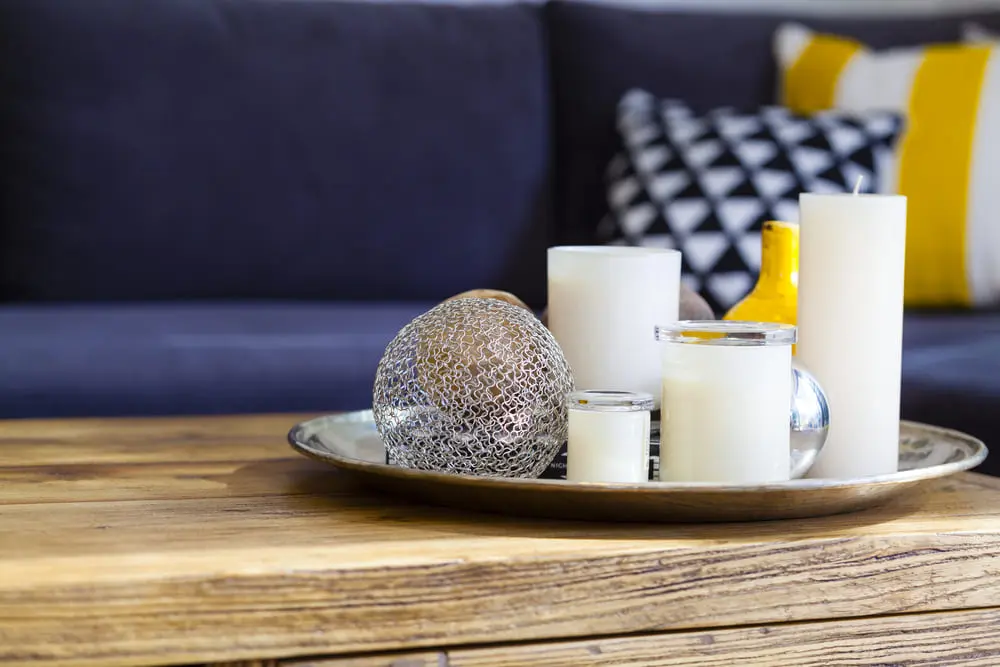 Table-in-front-of-a-wooden-sofa