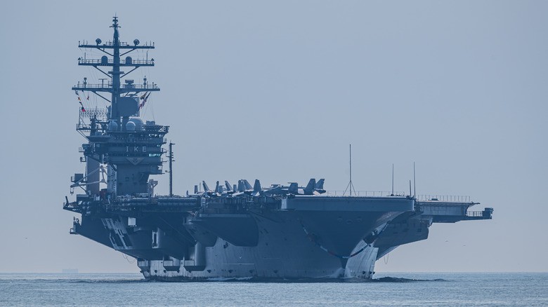 1-the-uss-dwight-d-eisenhower-a-nimitz-class-aircraft-carrier-approaching-a-port
