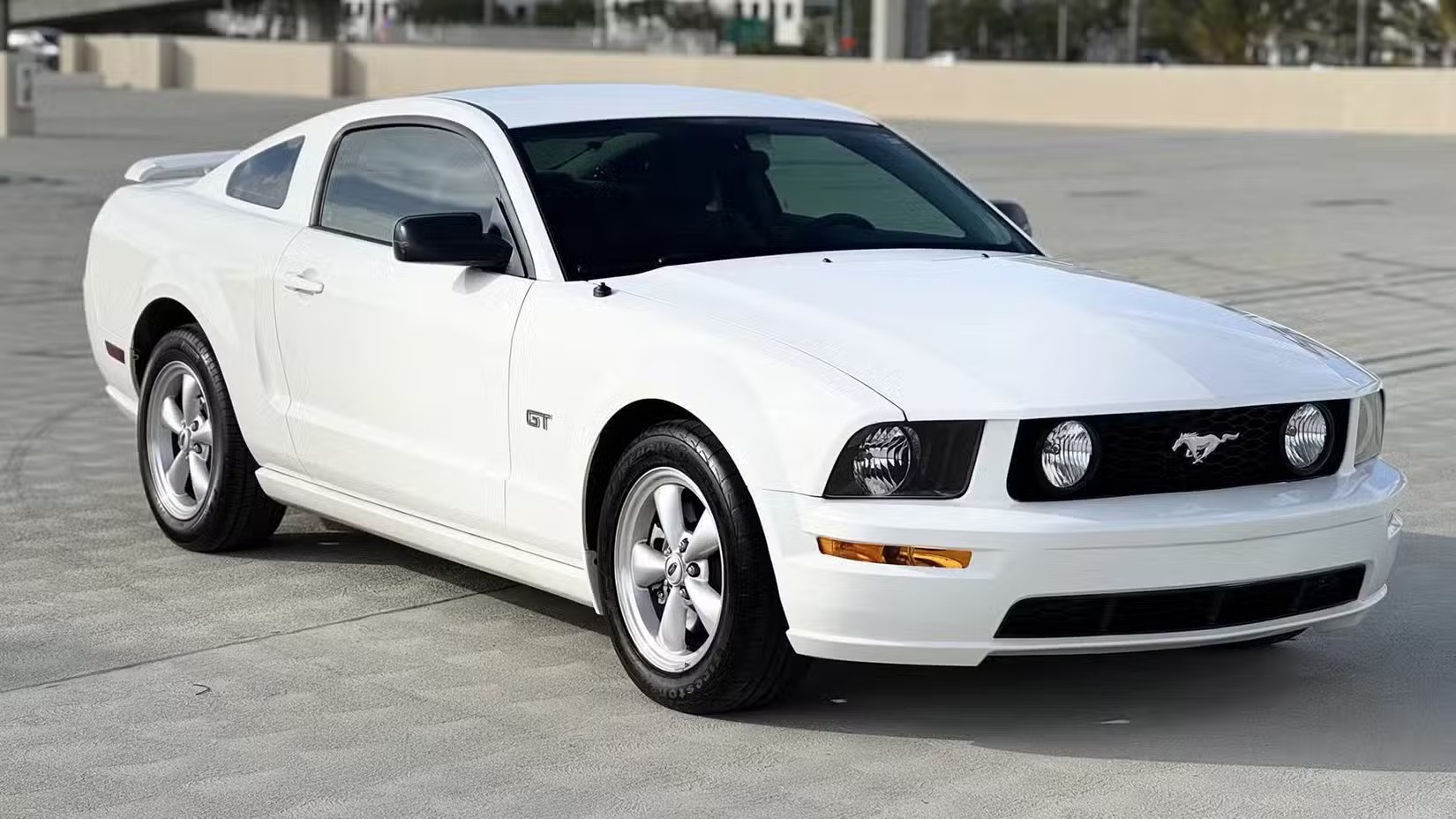 19fastest-used-car-for-20-000-2007-ford-mustang-gt-coupe-front-three-quarter-ezgif.com-avif-to-jpg-converter