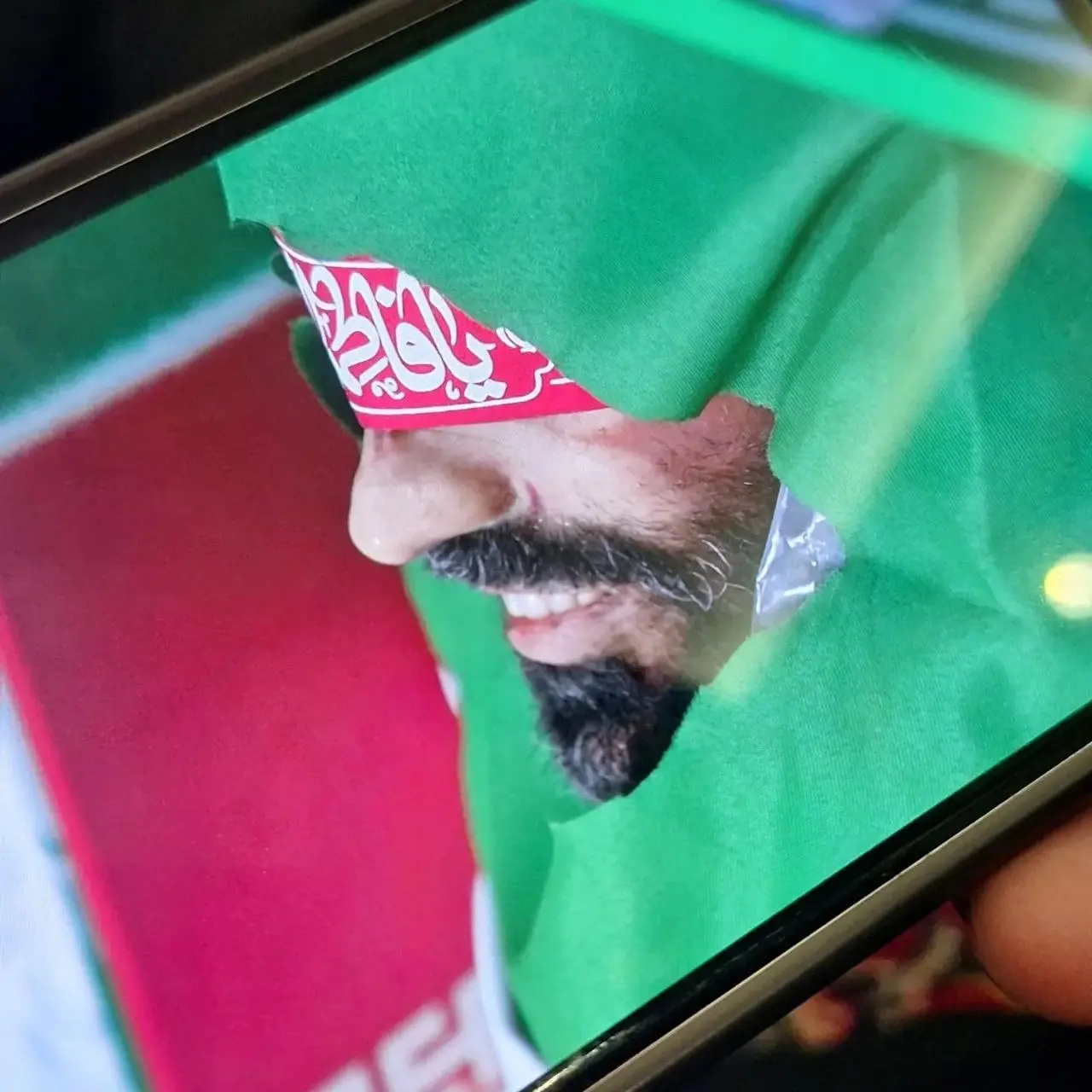 تصویر پیکر شهید لاریجانی با لبخند روی صورتش
