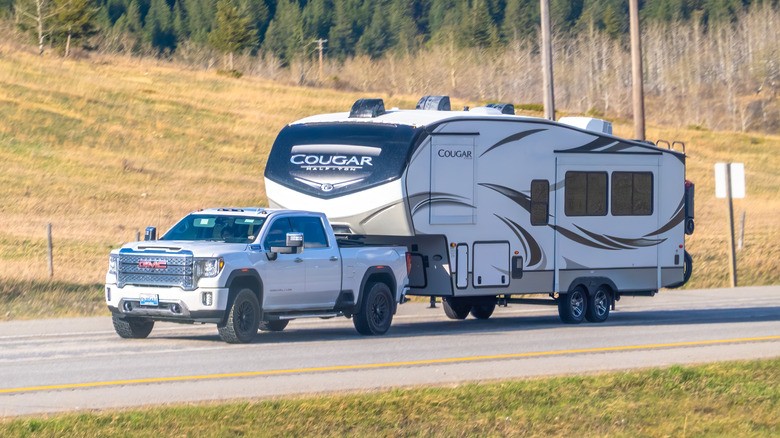 2-gmc-sierra-towing-a-fifth-wheel-trailer