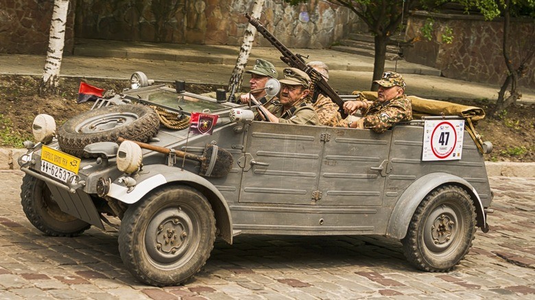 1-four-men-wearing-period-correct-german-uniforms-occupy-adunkelgrau-field-grey-kubelwagen-type-82