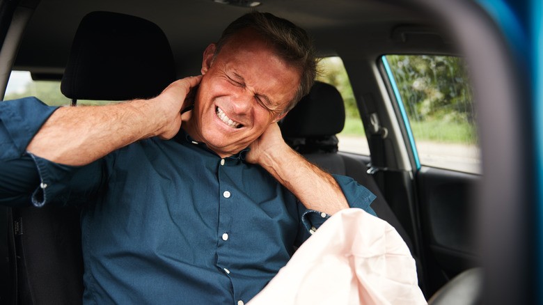 2-man-with-neck-pain-after-airbag-deployed