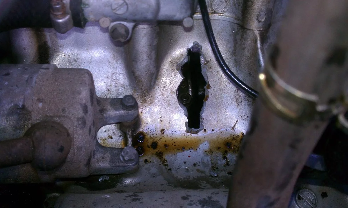 Examining-the-cause-of-thrown-a-rod.jpeg_11zon