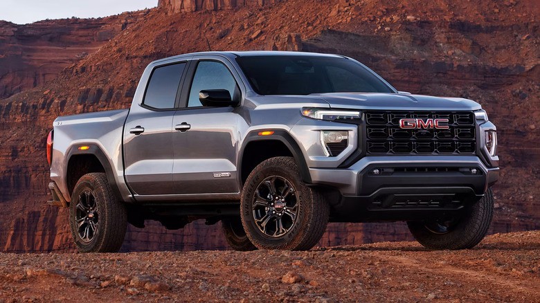 least-reliable-car-brands-2025-3-a-silver-2025-gmc-canyon-parked