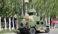 خودروهای جنگ الکترونیک ارتش چین در محل برگزاری کنکور 