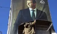 تصویر بشار اسد در دمشق تخریب شد