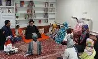 تصویری از رئیسی در میان کودکان فاقد سرپرست