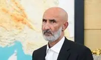 حمید نوری در حال گریه زیر تابوت شهید مقیسه