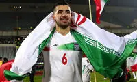 قاب مشترک سعید عزت‌اللهی کنار یک رپر