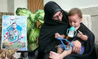 همسر و فرزند شهید مدافع حرم «محسن حججی»