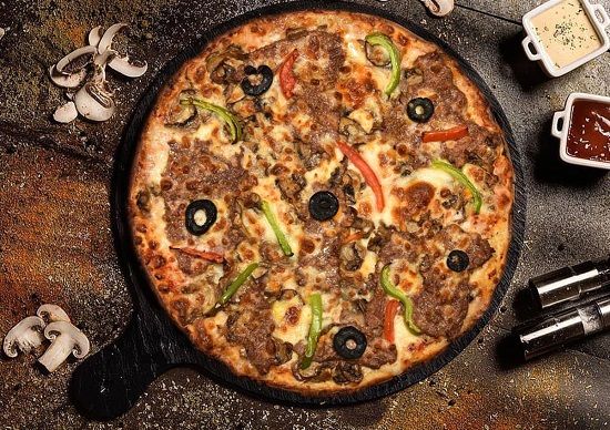 ۷ نکته برای خوشمزه‌تر شدن پیتزا‌های خانگی
