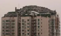 عکس: ویلای عجیب و دیدنی بر بام یک برج