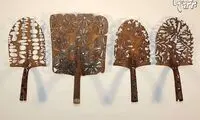 مجسمه سازی با سر زنگ زده بیل!