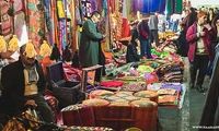 محتوای یک بنر در بازار تهران جلب توجه کرد