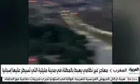 ورود غیرقانونی یک مهاجر به اسپانیا با چتر