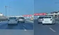 مزاحمت جنون‌آمیز راننده شاسی بلند برای یک سواری وسط اتوبان