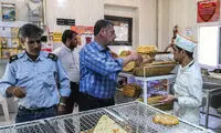 بنر خبرسازی که فقر در ایران را فریاد می‌زند