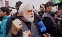 لحظه اصابت موشک به نزدیکی اژه‌ای در راهپیمایی