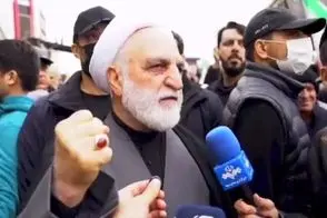 لحظه اصابت موشک به نزدیکی اژه‌ای در راهپیمایی