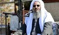 قابی از مولوی عبدالحمید و وزیر کشور در یک مراسم