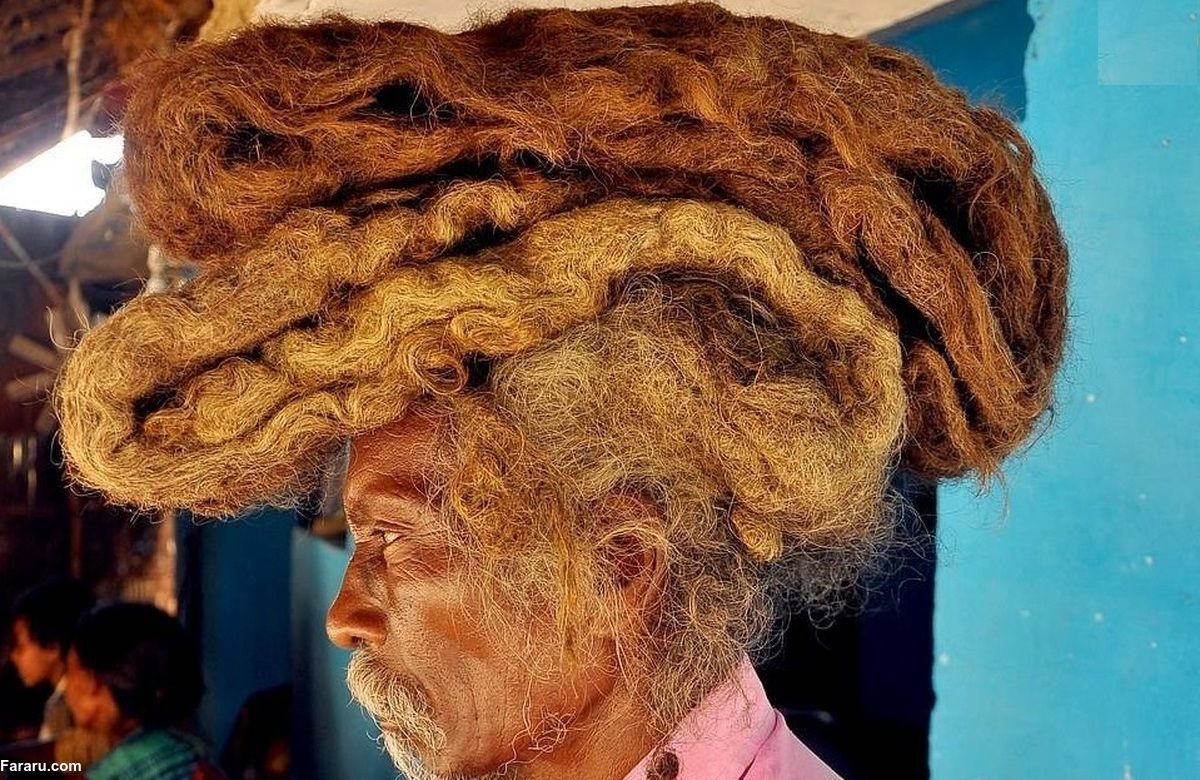  مردی با مو‌های ۴.۵ متری که ۵۰ ساعت طول می‌کشد تا خشک شوند