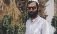 عکسی از رهبر انقلاب با لباس بلوچی