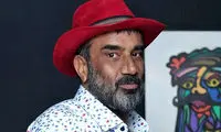امیرحسین قیاسی در کنار نصرالله رادش و همسرش