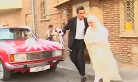 عکسی از یک عروس و داماد پای سفره عقد که تاریخی شد