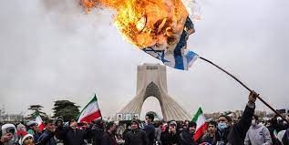 پرچم آمریکا و اسرائیل در تهران به آتش کشیده شد