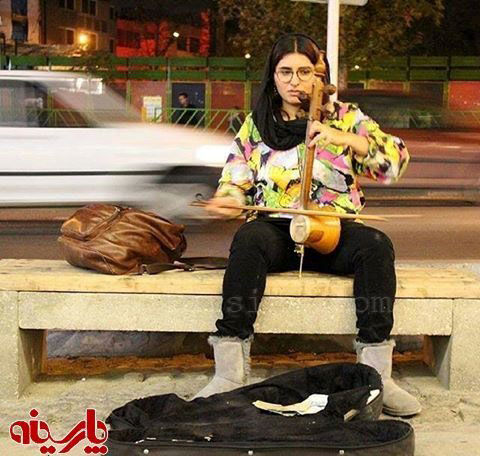 عکس: دختر نوازنده در خیابان ولی عصر