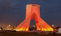 چرا برج آزادی با نور قرمز نورافشانی شد؟