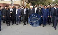 روحانی و فریدون در مراسم تشییع پیکر خواهرشان