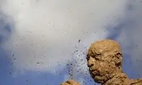 عکس آسوشیتد پرس از گِل مالی در عاشورا