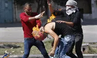 عکس: آتش گرفتن یک فلسطینی