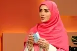 حضور مجری زن صداوسیما با اسلحه روی آنتن زنده