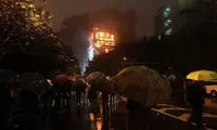 برج بلند چینی غرق در آتش +عکس