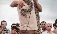 عکس: معرکه گیری در ساحل بابلسر