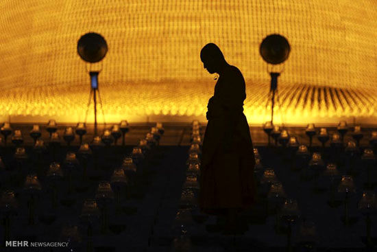 مراسم یک روز مقدس در تایلند +عکس