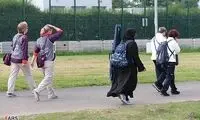 تیرانداز زن ایرانی با چادر در المپیک +عکس